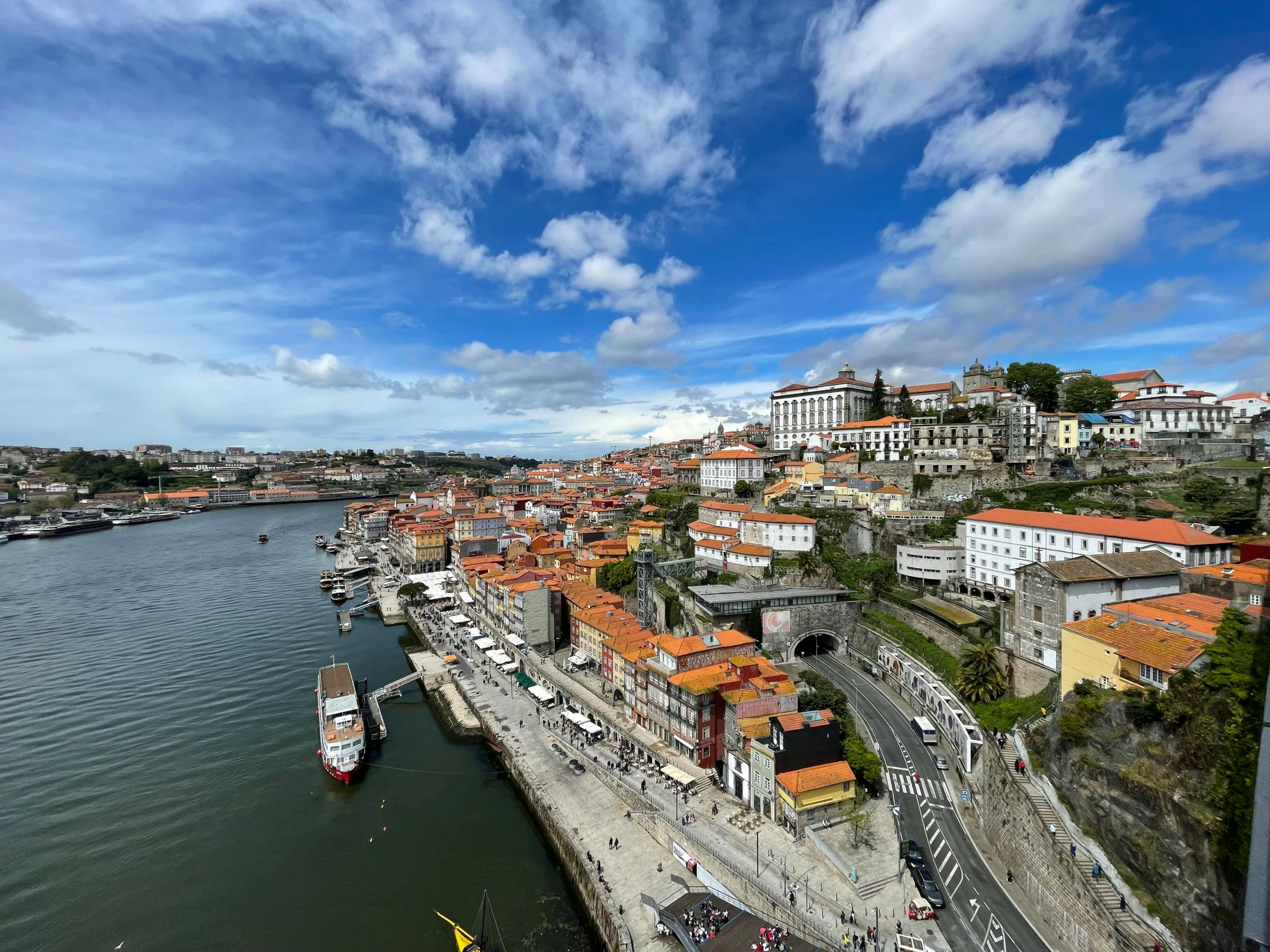 a river is running between several large buildings