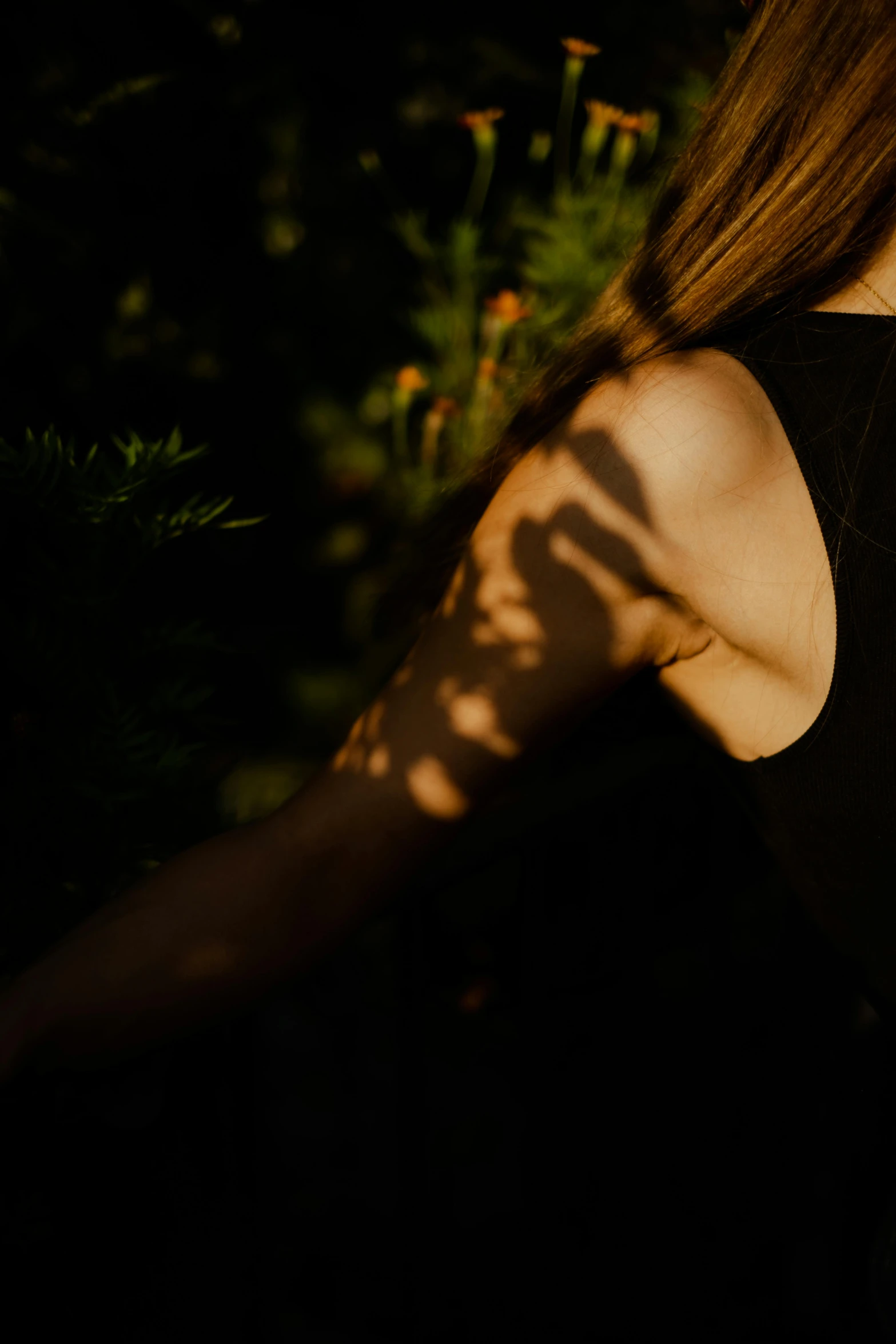 a woman is holding a frisbee near her chest