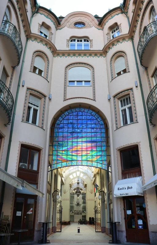 a very large glass window that has a skylight