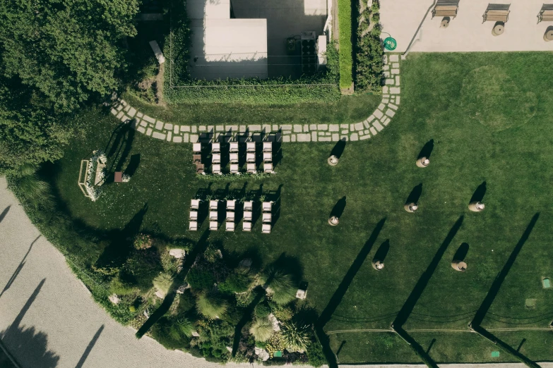 an overhead view of some chairs in a grass area