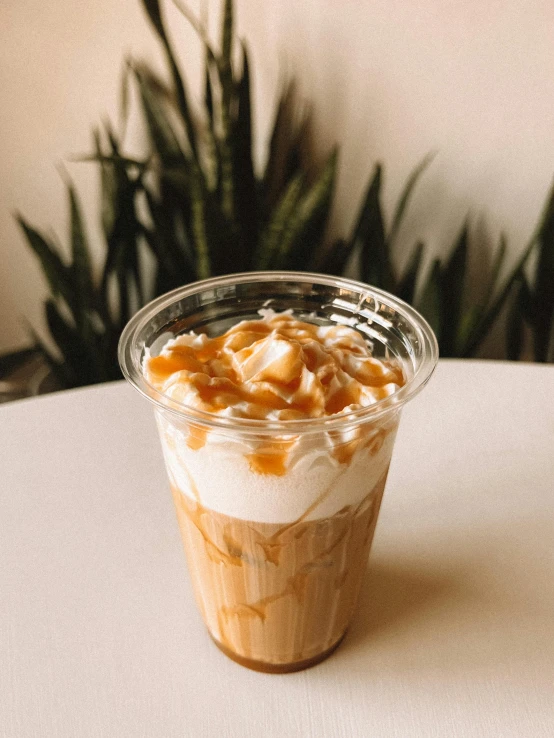 a container of ice cream on a white surface