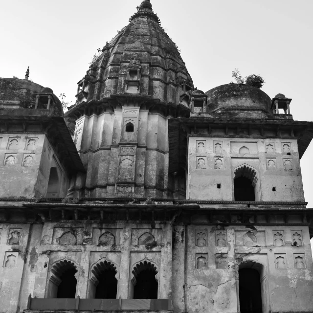 an old building with a tower on top of it