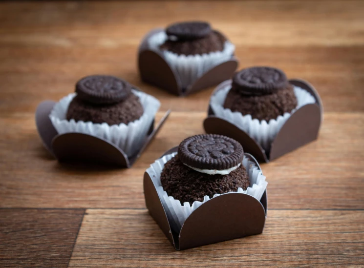 several pieces of chocolate are shown with a cookie on top