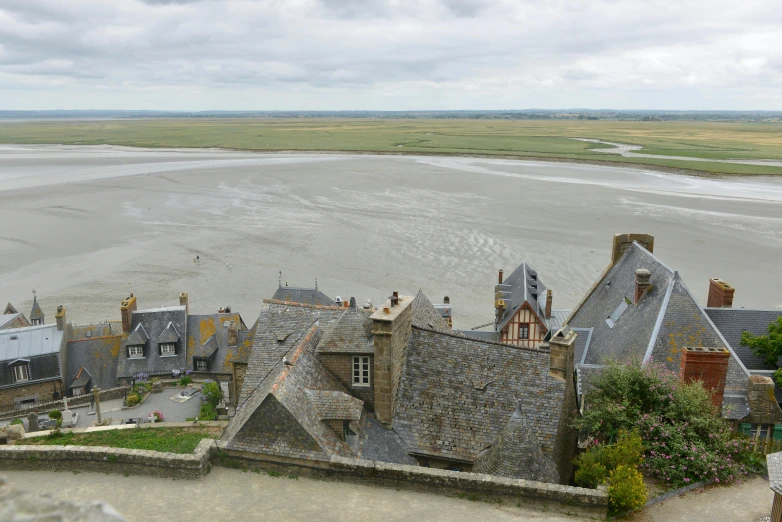 several houses built around the river in the middle of nowhere