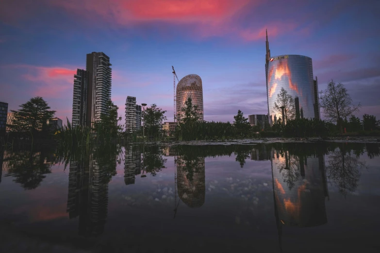 the city skylines and skyline reflect on the water