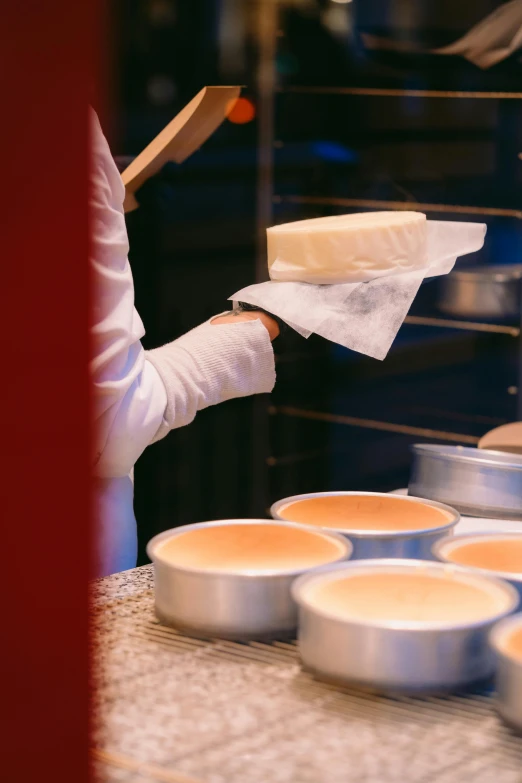 some plates with cakes sitting on a counter