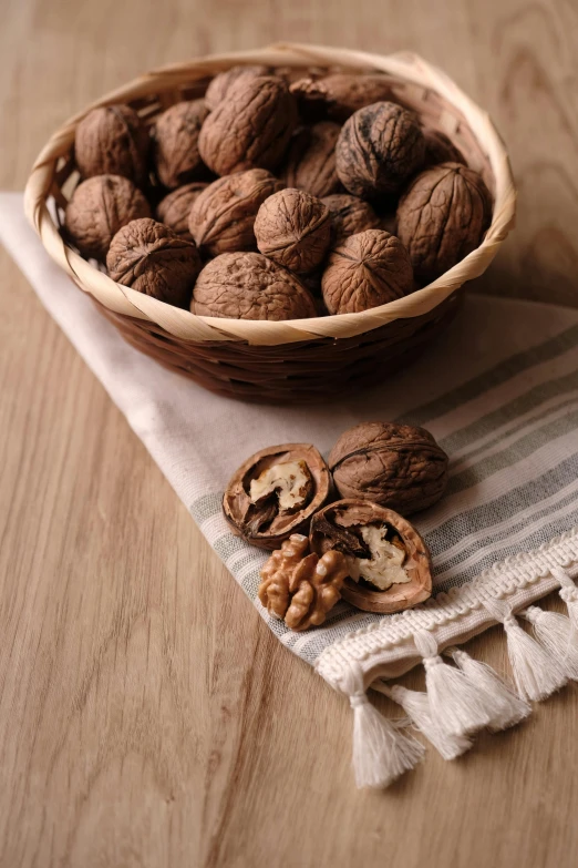 an arrangement of nuts in a bowl and napkin