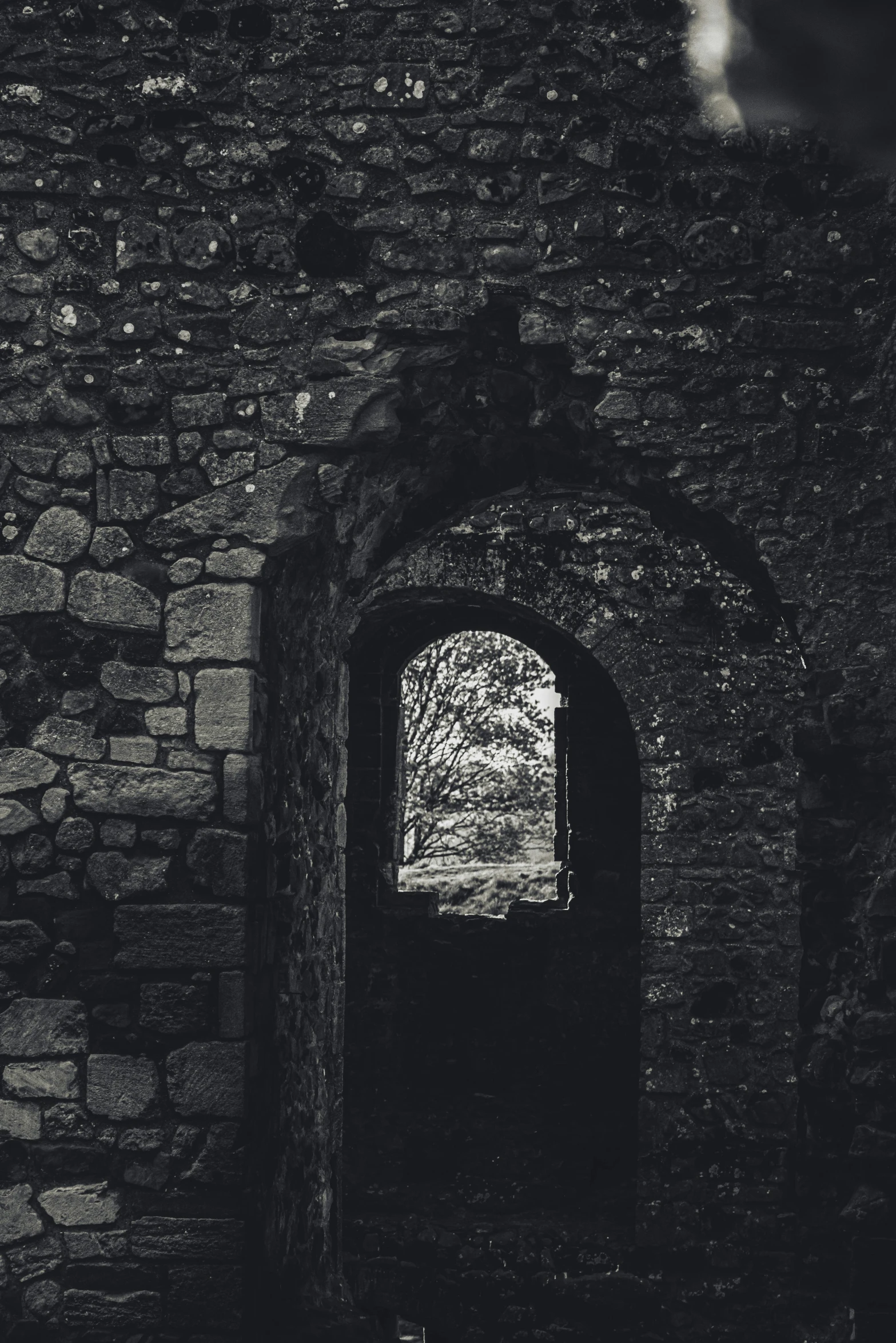 an open doorway that has light coming through