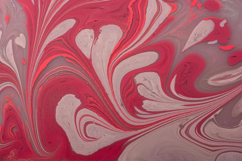 abstract red and grey swirls design on a red and grey surface