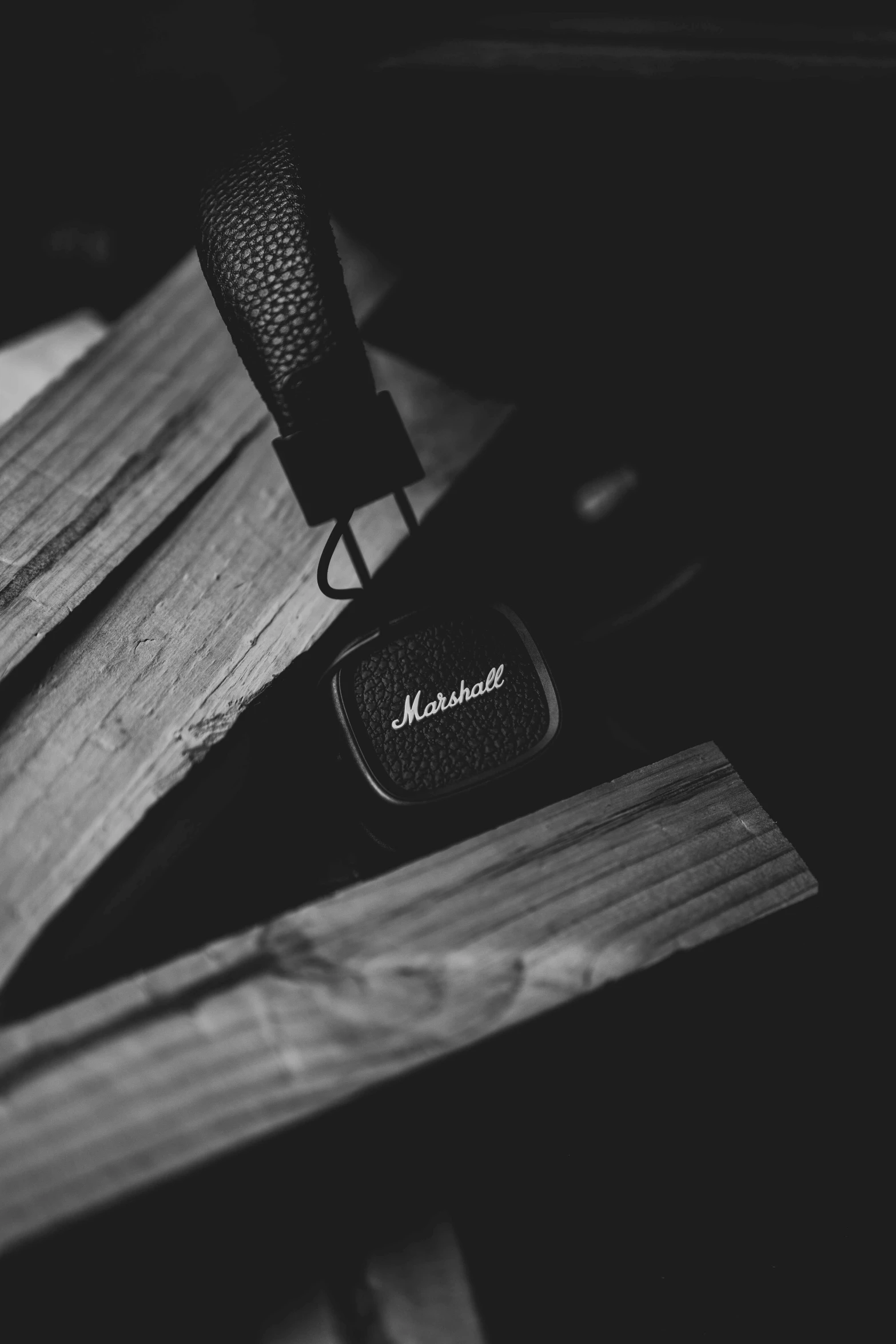 a wooden chair with black and white image of wood