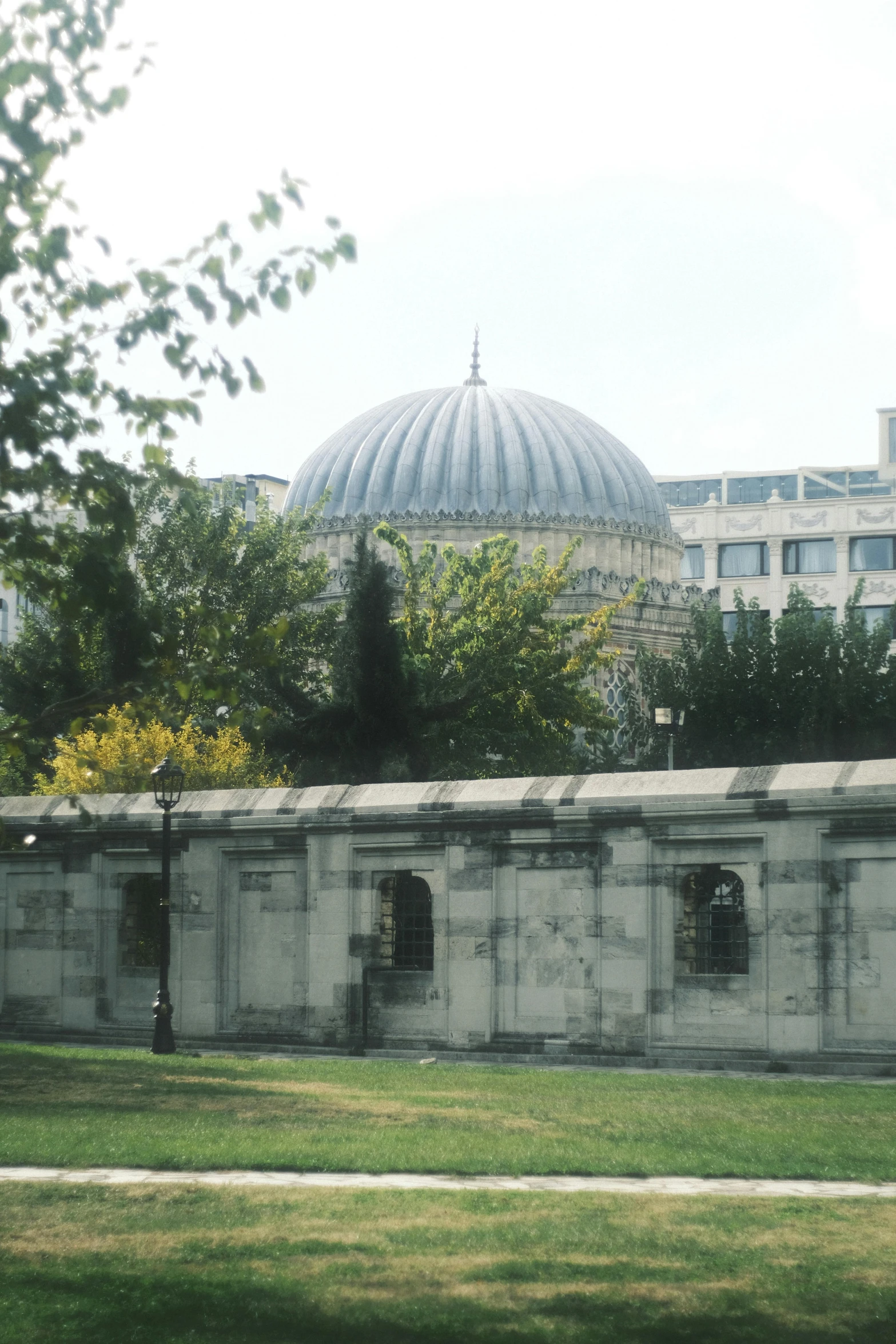 a row of gray building with a domed top