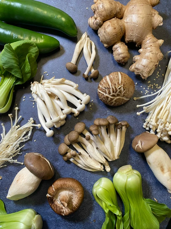 a variety of vegetables that are on the floor