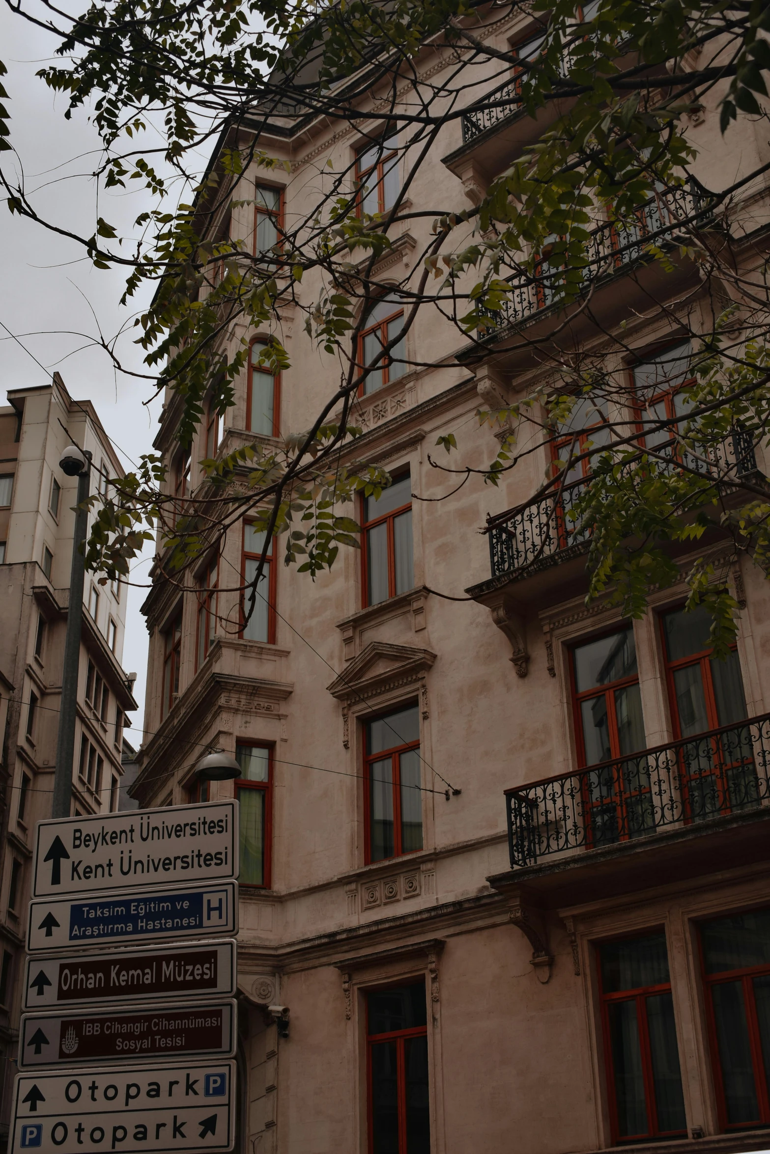 there are many signs in front of an old building