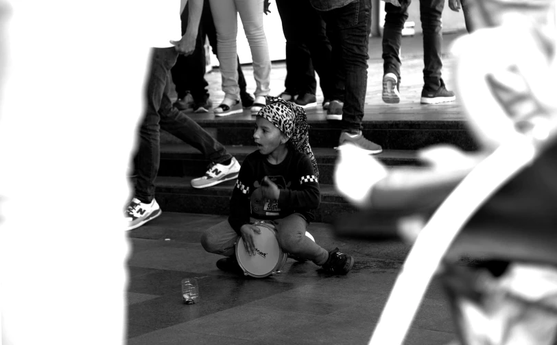 a child is playing with a toy guitar