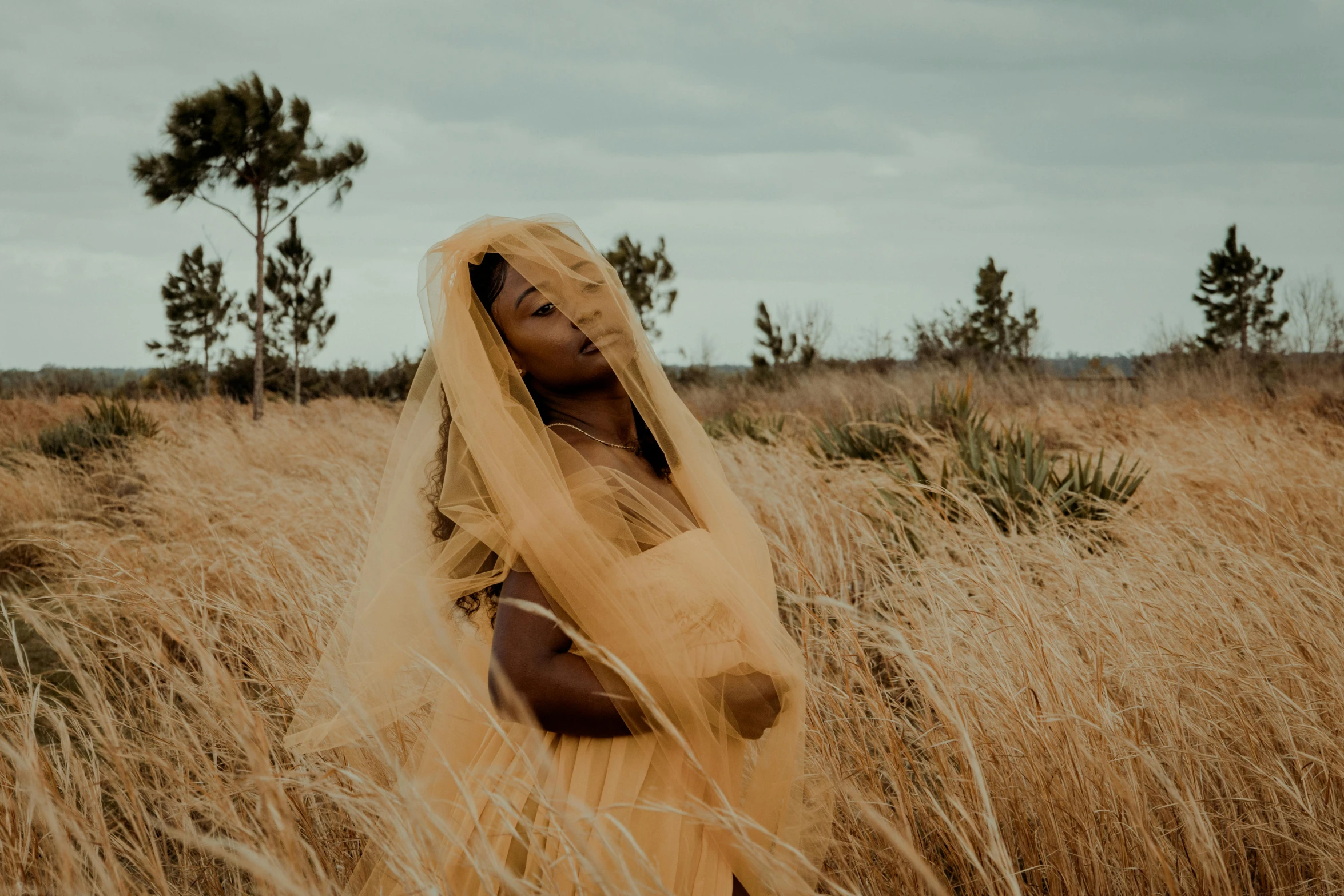 there is a young woman wearing yellow clothes