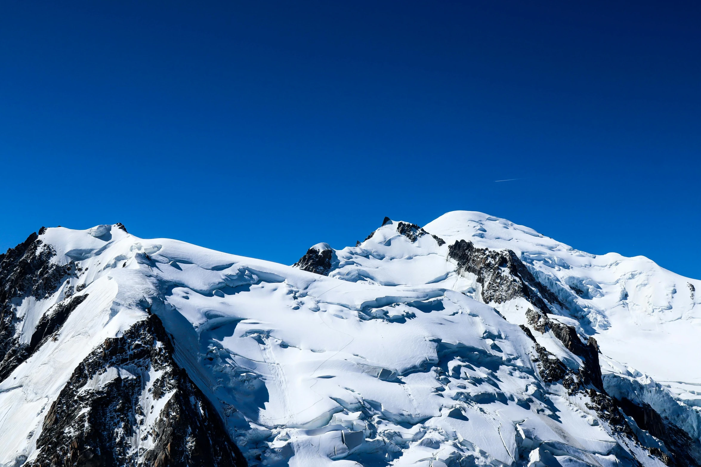 a snowboarder is jumping high in the air