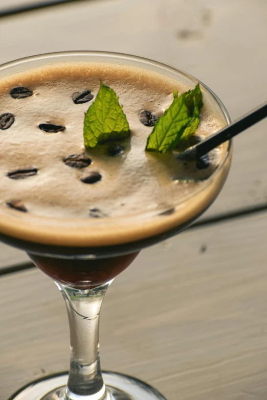 a close up of a glass with food on top