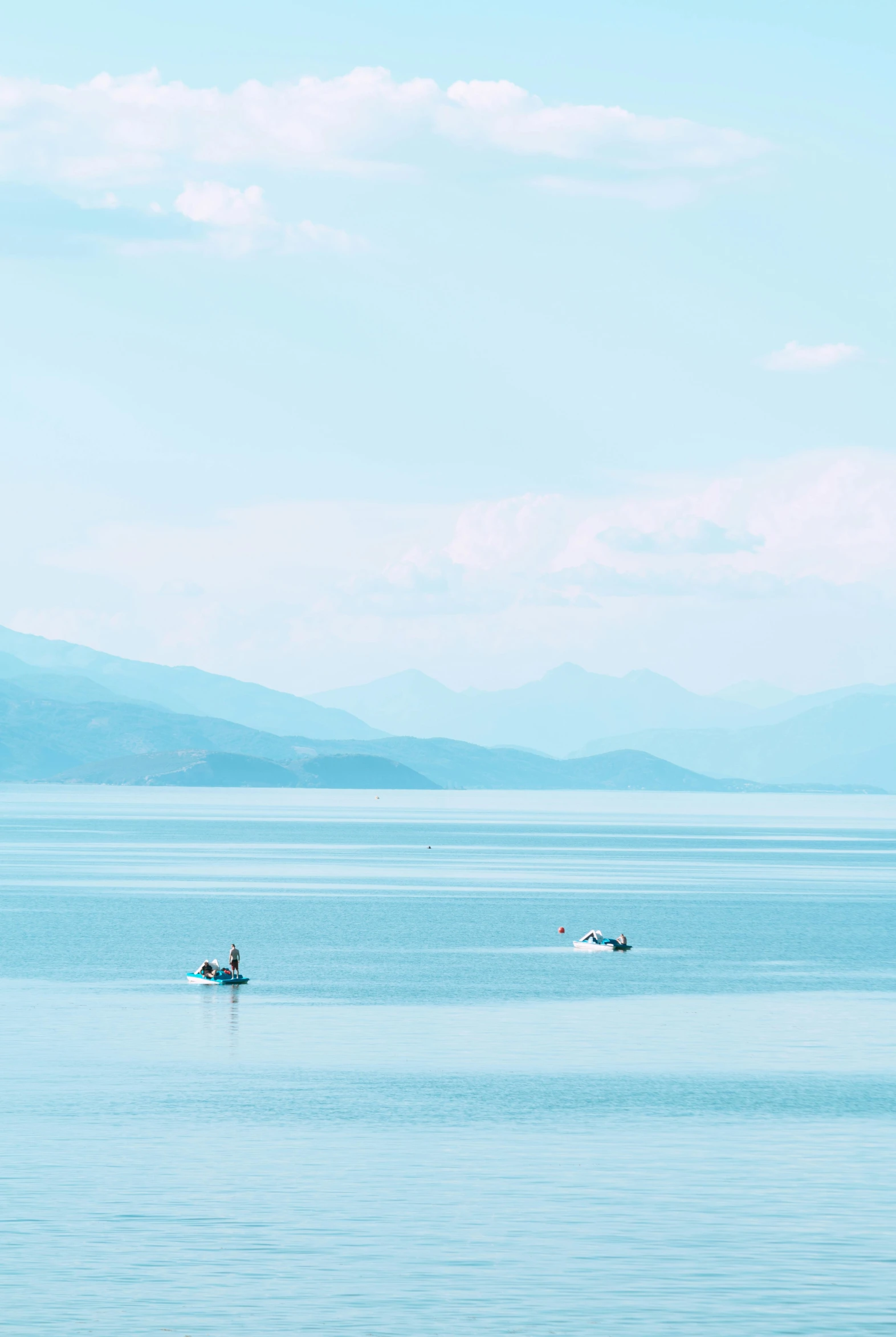 a person riding a jet ski in a large body of water