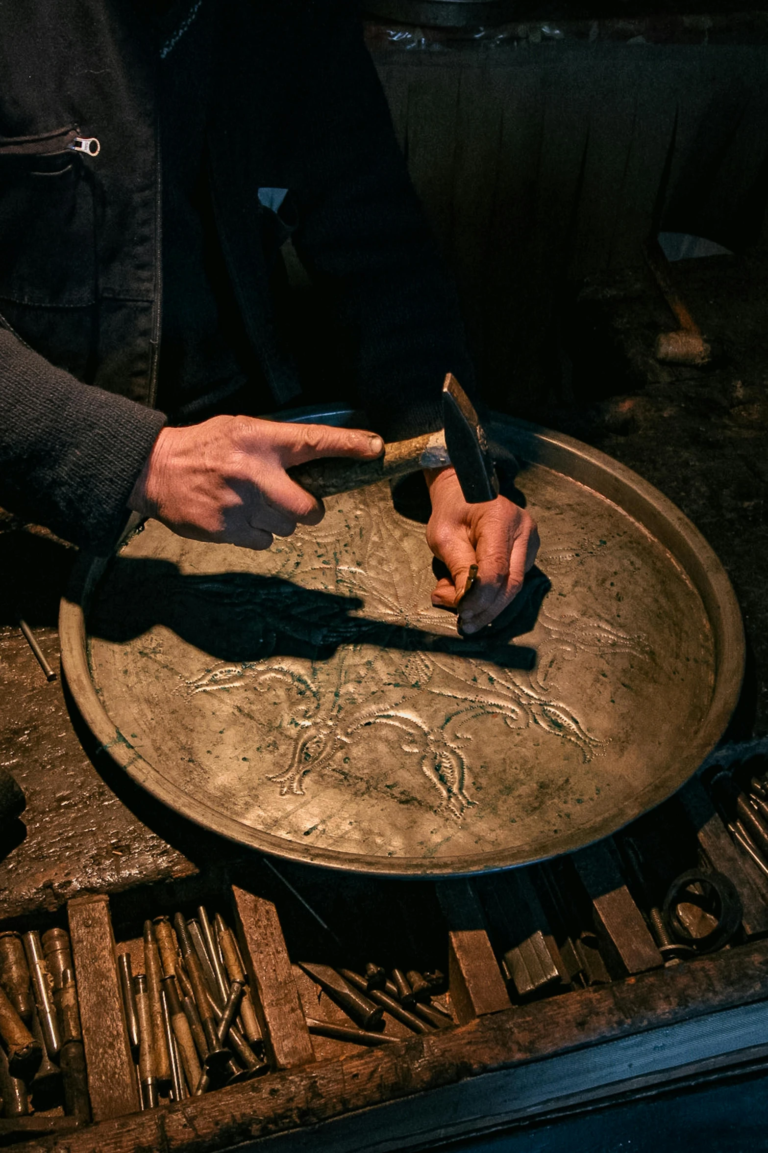 someone doing soing with scissors on a tray