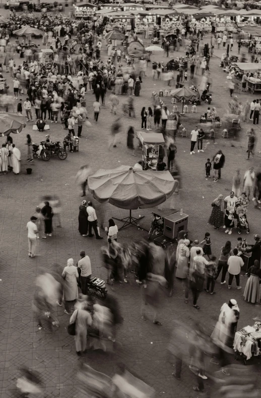 many people are in a crowded city square