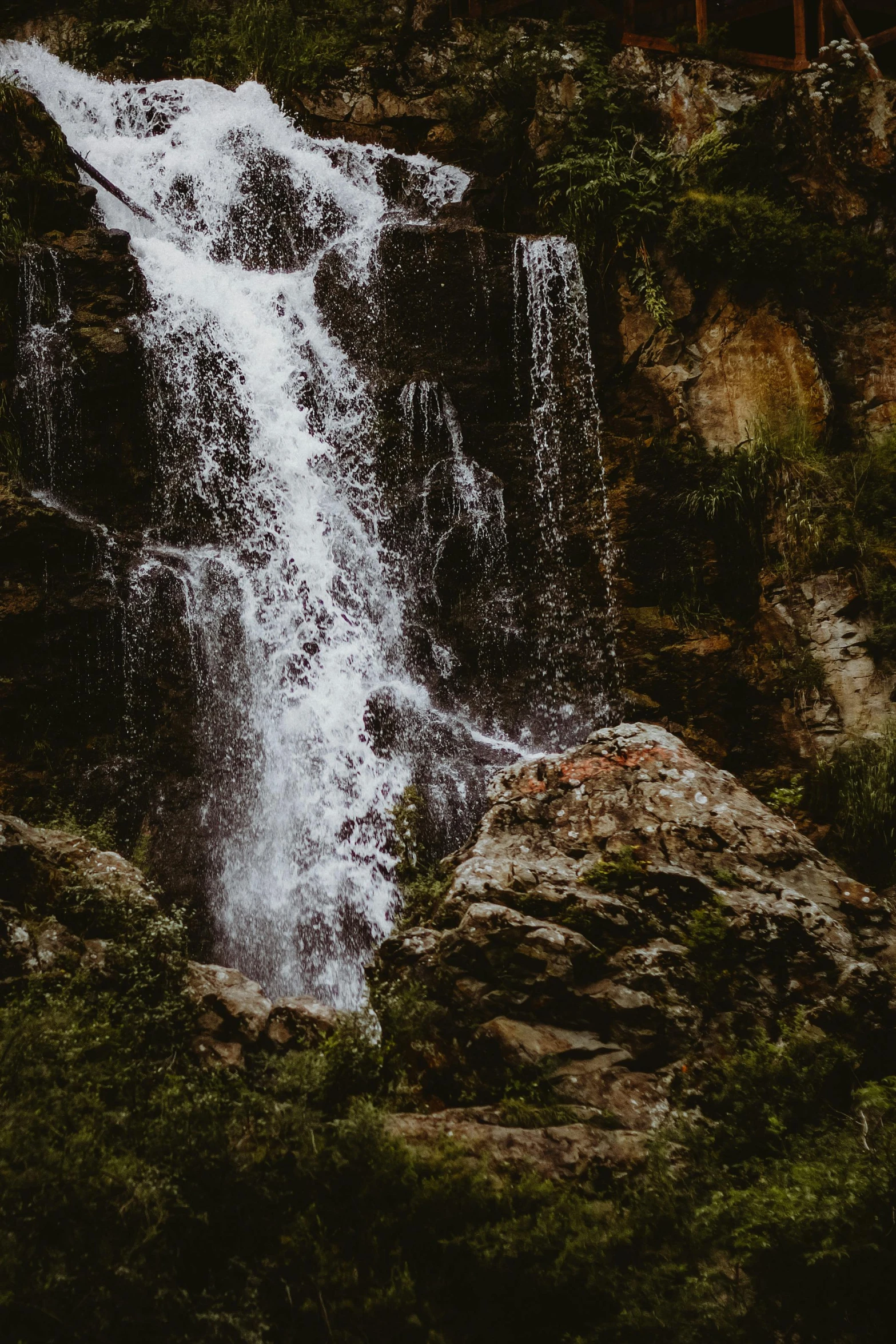 a very large waterfall with lots of water coming down it