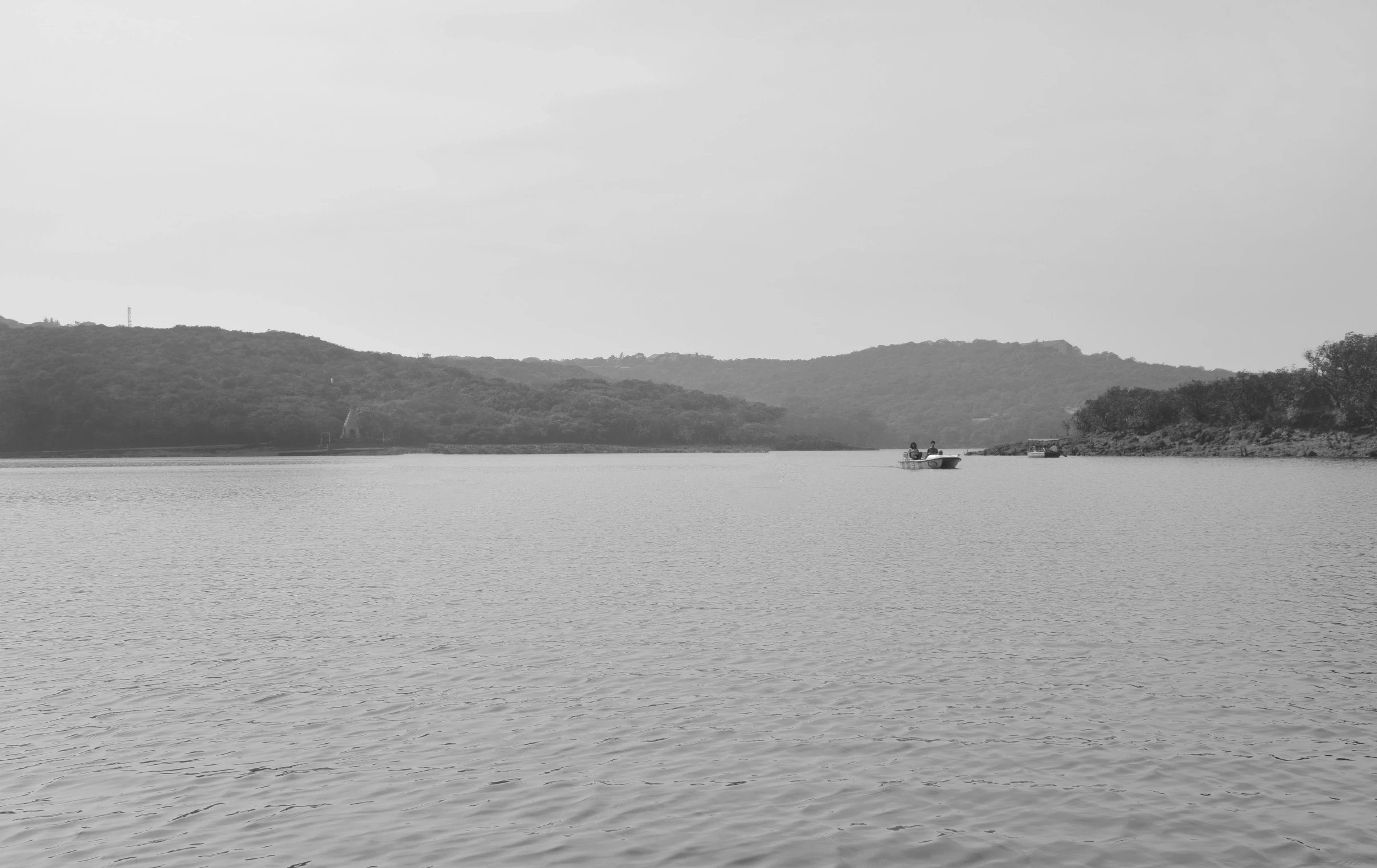 a boat that is floating on a river