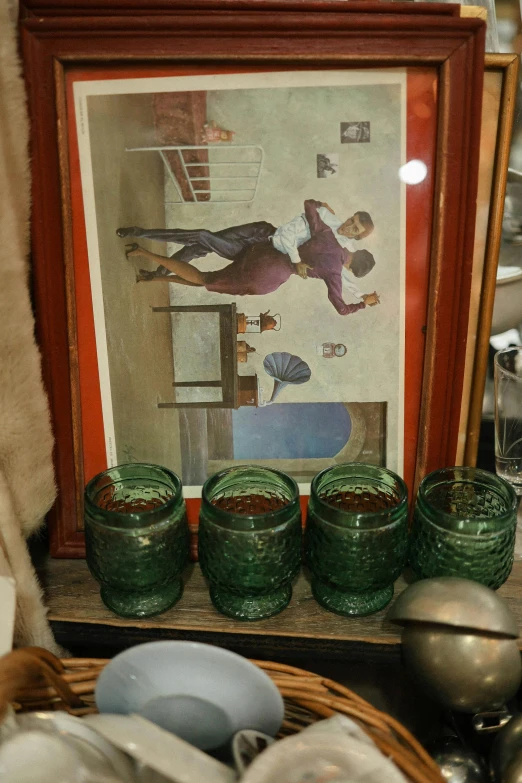 a vintage pograph is on display on a shelf