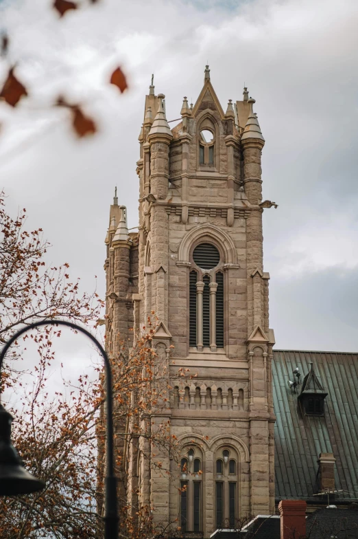 an old building with a steeple and a clock