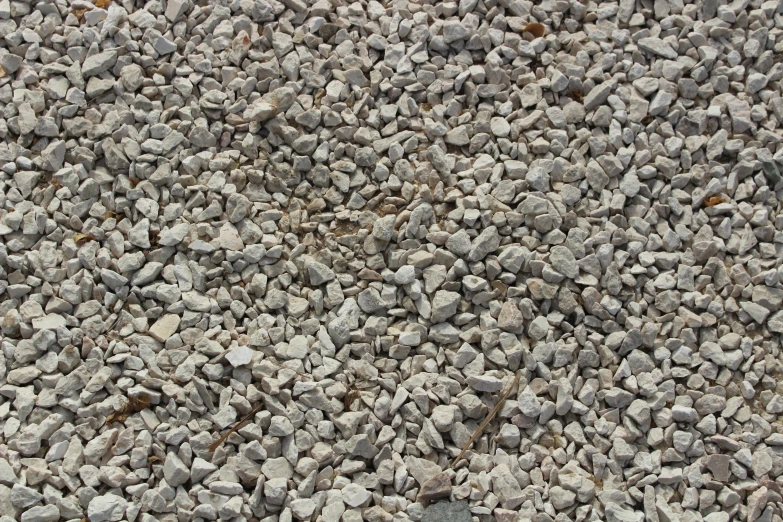 rocks on pavement all together near one another