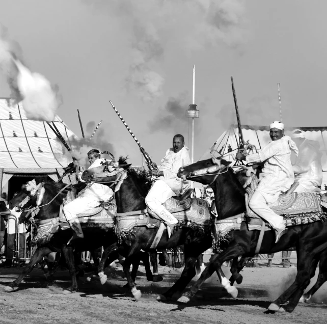 an old po of some men riding horses