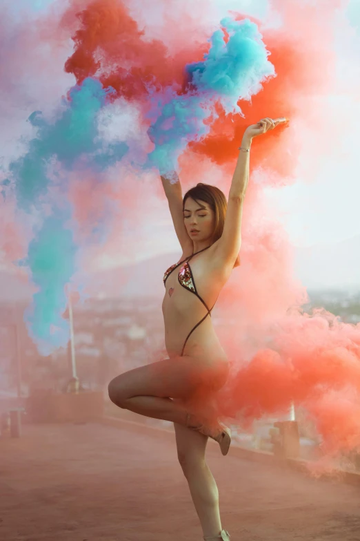 a woman in a bikini and some kind of blue and red substance