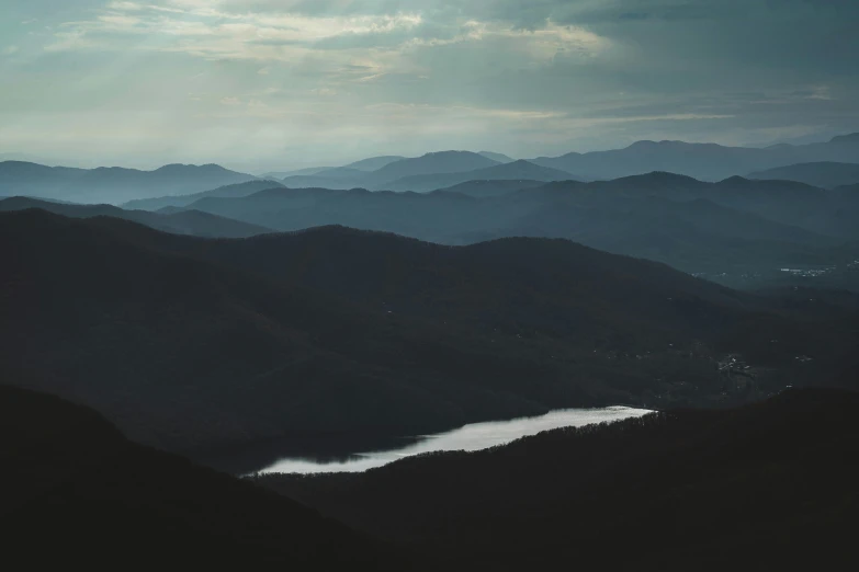 the mountains that surround lake have water under them