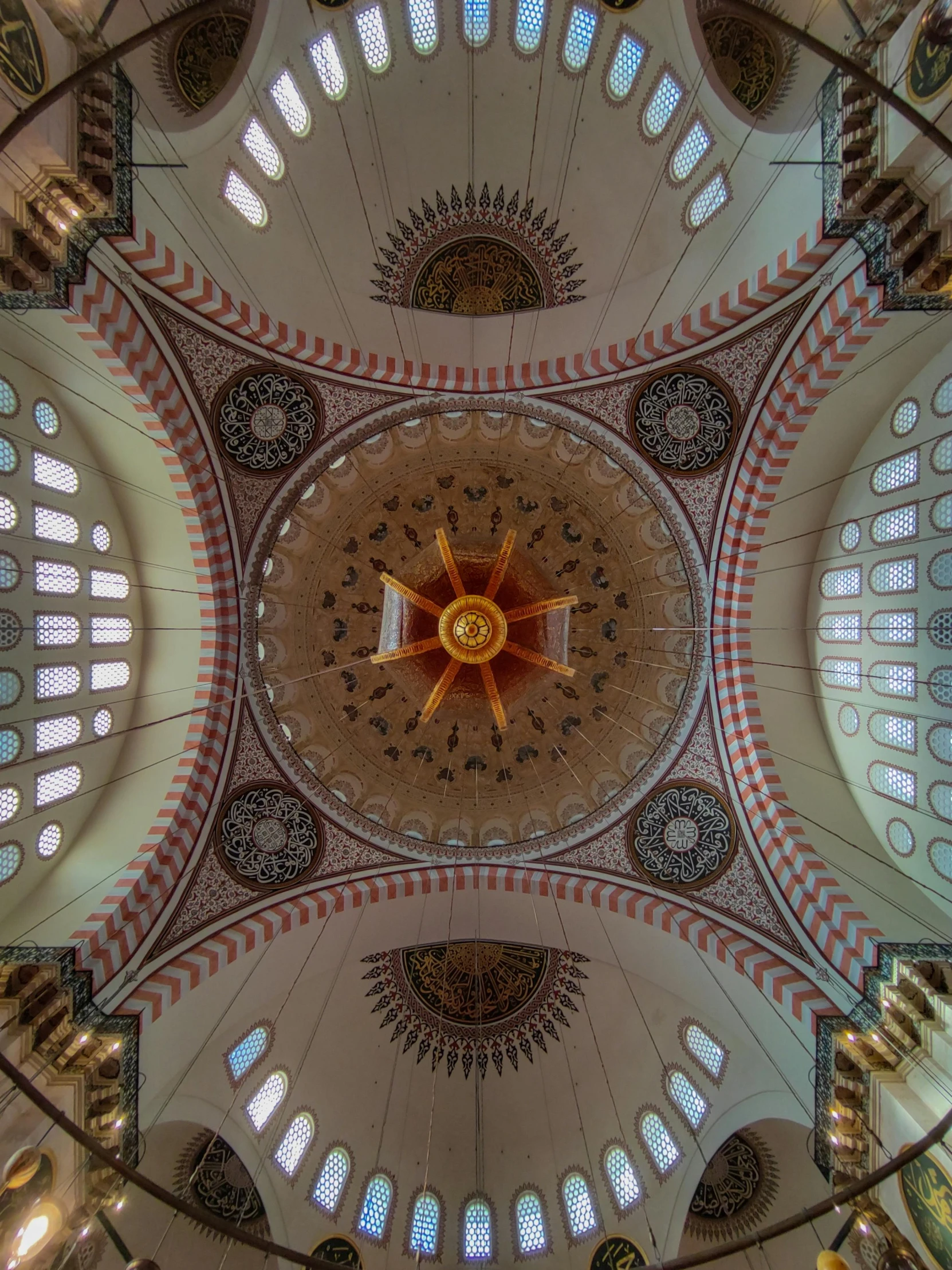 the dome inside of an old building with large windows