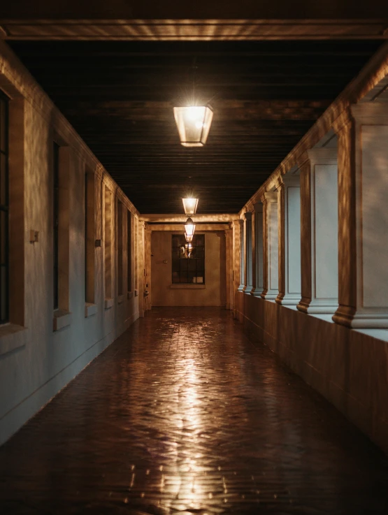 the lights are on at the long, open hallway