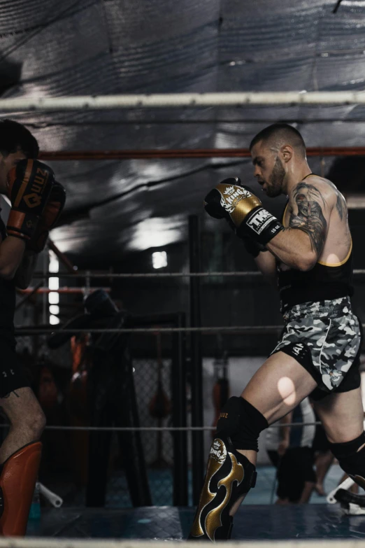 a man is in the ring with his boxing gloves on