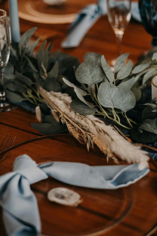 the tables set are decorated with various types of flowers and napkins