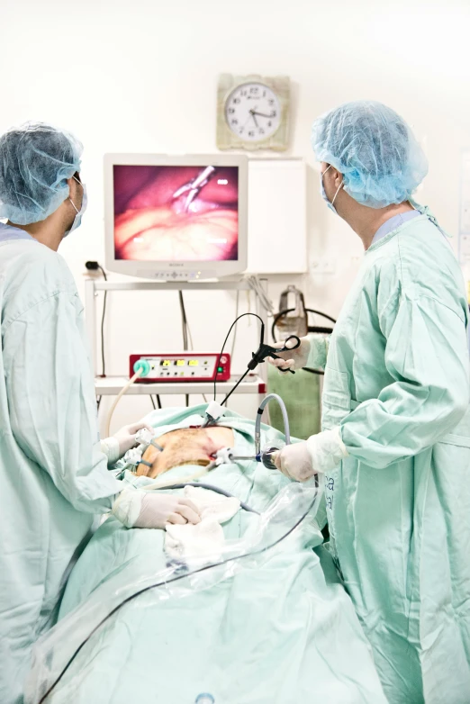two surgeons at the hospital preparing to perform an operation