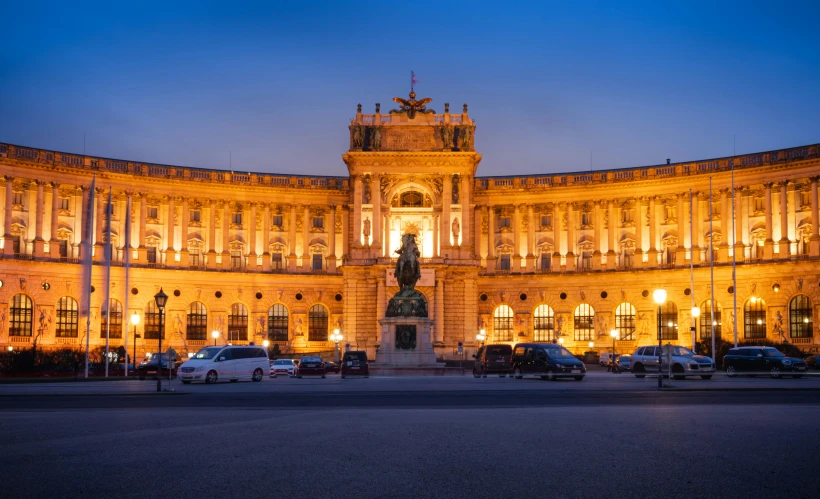 a night view of some large buildings with lights