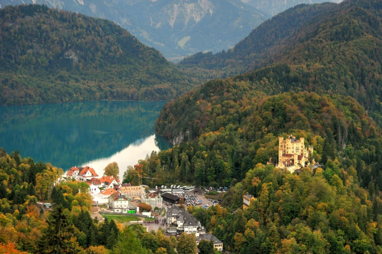 a town nestled on the edge of a large mountain