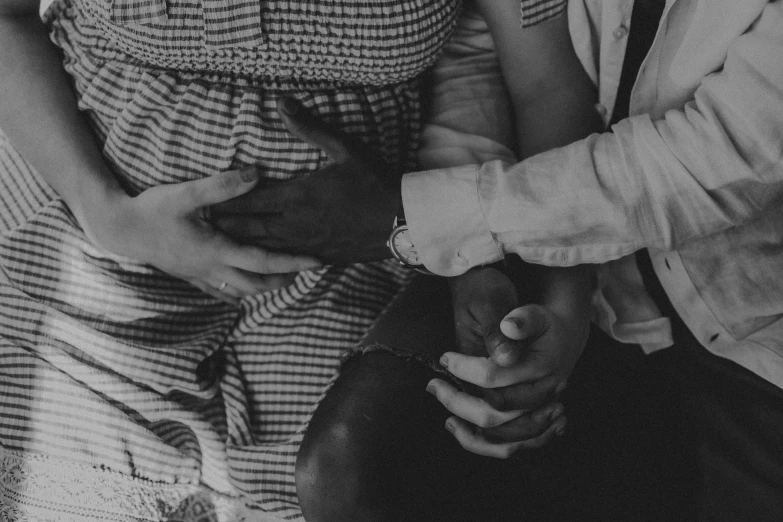 a man in a white shirt and woman in a dress