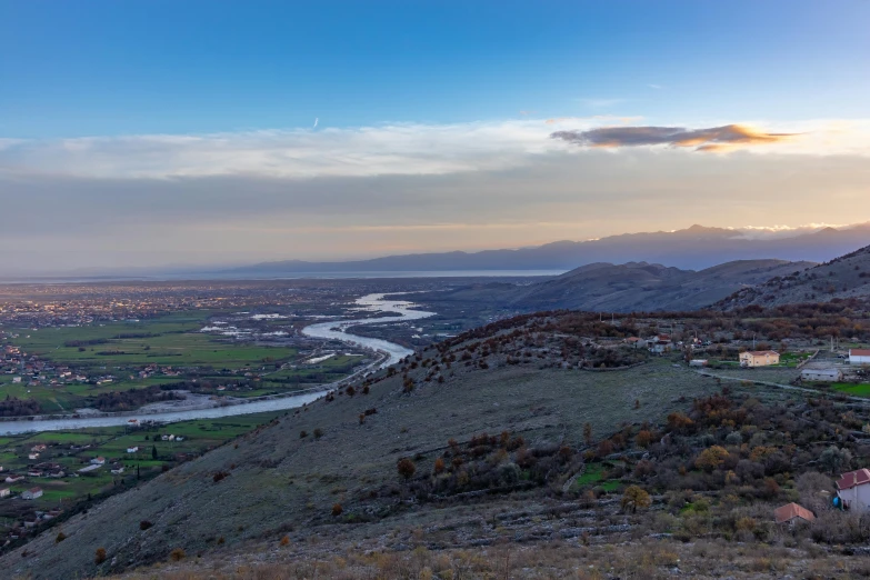 view of a river and a valley in the distance