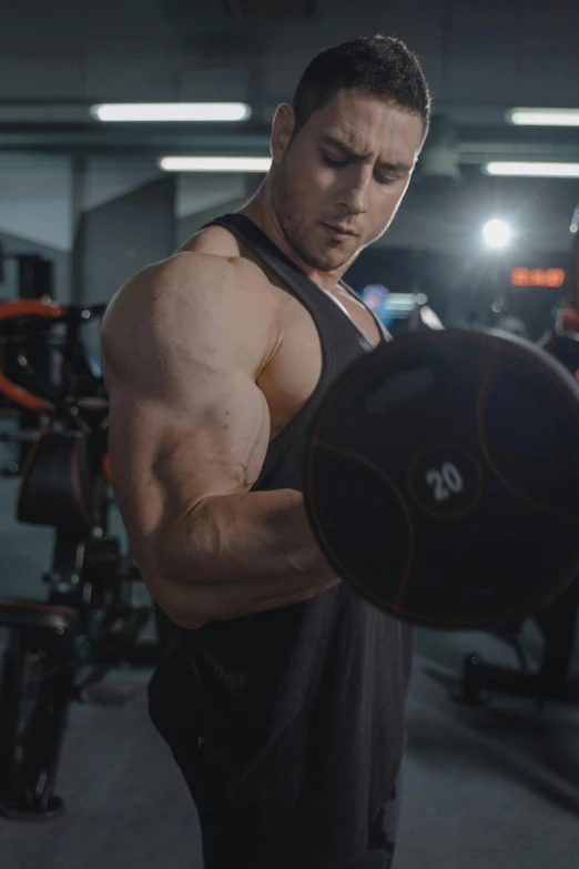 the man is working out with a medicine ball