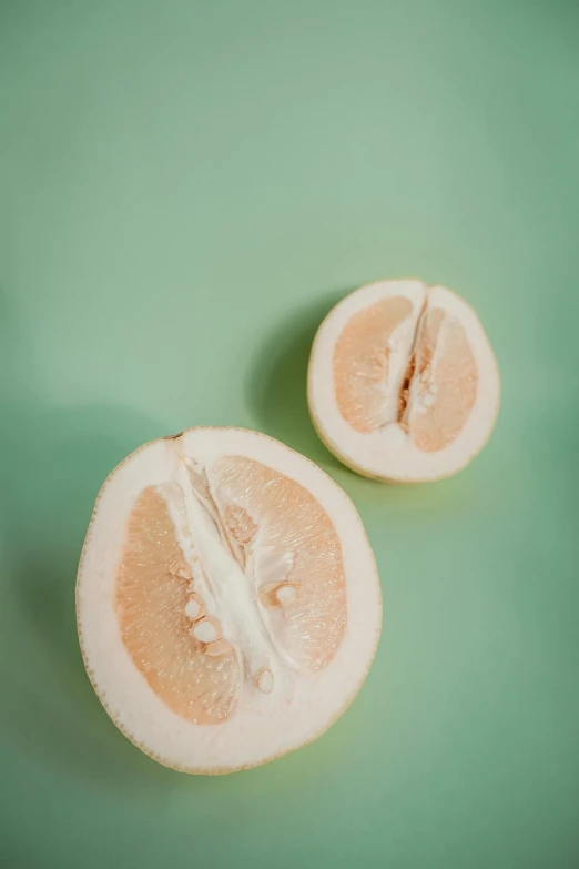 this orange is half a melon and on the table