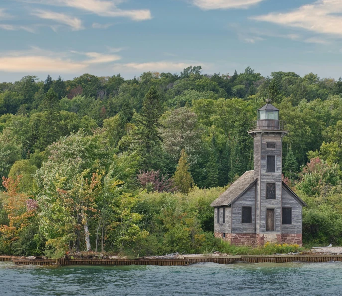 the old church sits on an island surrounded by trees