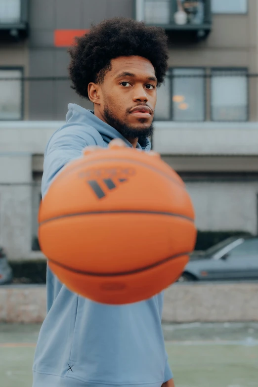 a man with a basketball next to him