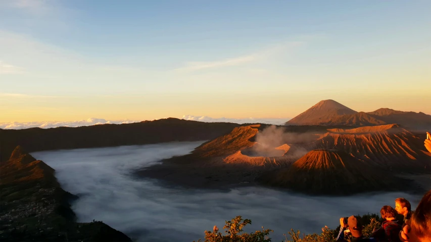 a mountain covered in fog and low cloud