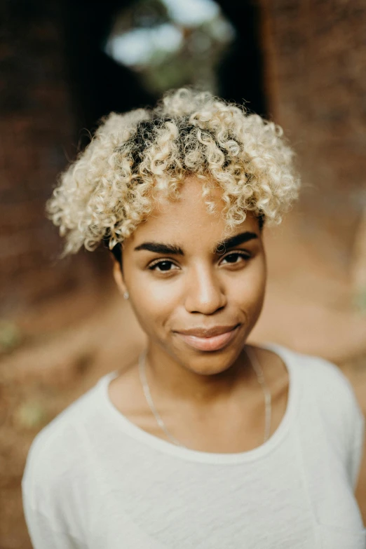 a black woman is smiling while posing for a po