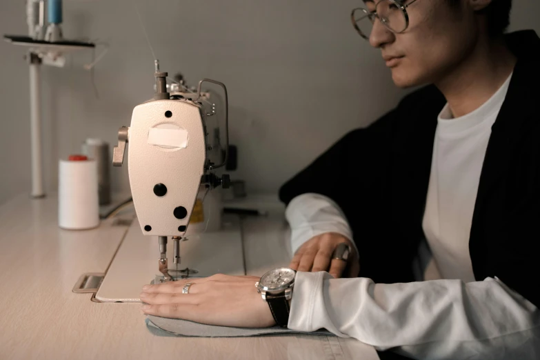 a person is doing some work at a table