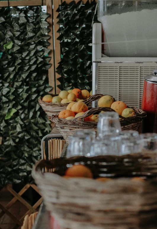 a group of baskets that are next to a wall