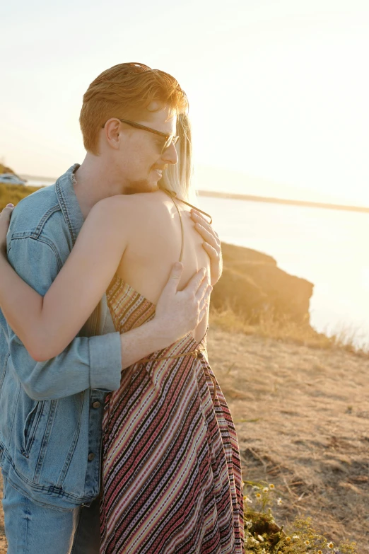 two people emce at the beach on a sunny day